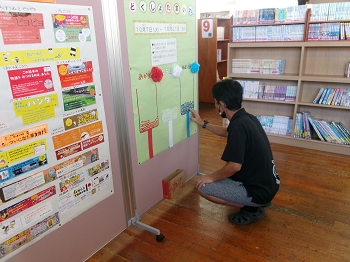 団顧問の先生が数を数えています