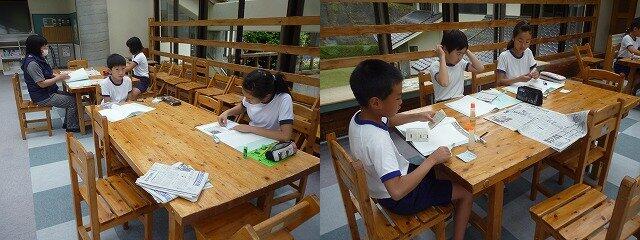 記事に対する意見を書く児童