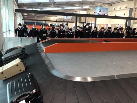 手荷物受け取り中