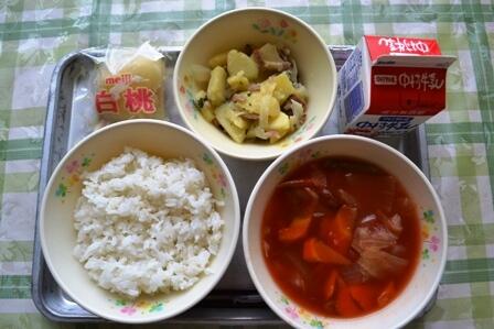 麦ごはん・みつせ鶏団子のトマトスープ・ジャーマンポテト・フローズン白桃・牛乳